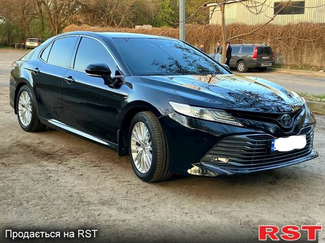 Черный Тойота Камри, объемом двигателя 2.5 л и пробегом 69 тыс. км за 30900 $, фото 1 на Automoto.ua