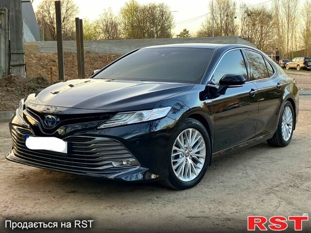 Черный Тойота Камри, объемом двигателя 2.5 л и пробегом 69 тыс. км за 30333 $, фото 1 на Automoto.ua