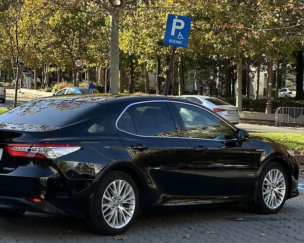 Чорний Тойота Камрі, об'ємом двигуна 2.49 л та пробігом 76 тис. км за 34000 $, фото 3 на Automoto.ua
