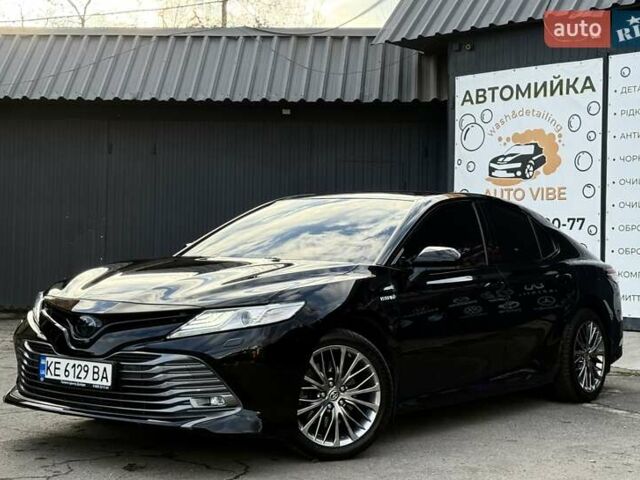 Черный Тойота Камри, объемом двигателя 2.49 л и пробегом 128 тыс. км за 29000 $, фото 1 на Automoto.ua