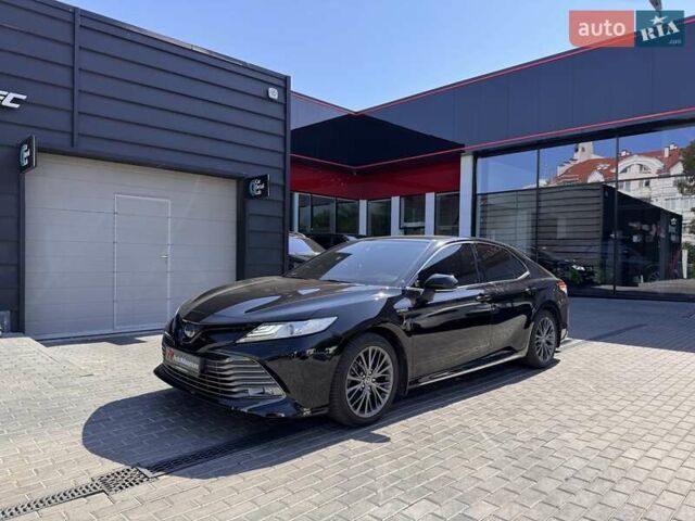 Чорний Тойота Камрі, об'ємом двигуна 2.49 л та пробігом 130 тис. км за 26900 $, фото 2 на Automoto.ua