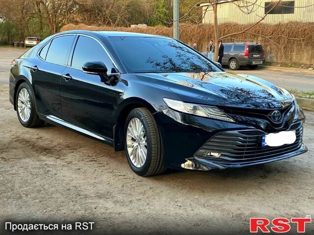 Черный Тойота Камри, объемом двигателя 2.5 л и пробегом 69 тыс. км за 30999 $, фото 1 на Automoto.ua
