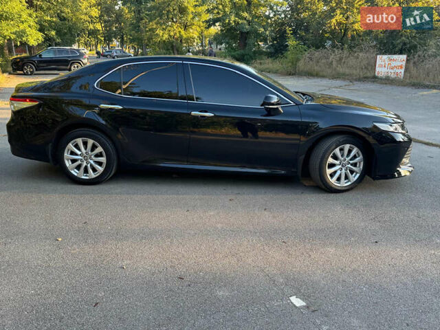 Чорний Тойота Камрі, об'ємом двигуна 2.49 л та пробігом 145 тис. км за 23900 $, фото 1 на Automoto.ua