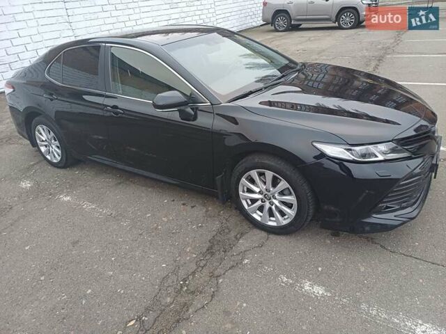 Черный Тойота Камри, объемом двигателя 2.49 л и пробегом 115 тыс. км за 24500 $, фото 2 на Automoto.ua