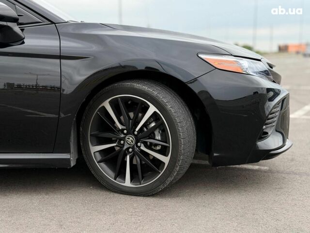 Черный Тойота Камри, объемом двигателя 2.5 л и пробегом 105 тыс. км за 24990 $, фото 11 на Automoto.ua