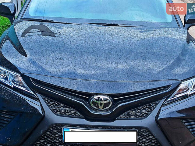 Черный Тойота Камри, объемом двигателя 2.5 л и пробегом 21 тыс. км за 23500 $, фото 1 на Automoto.ua