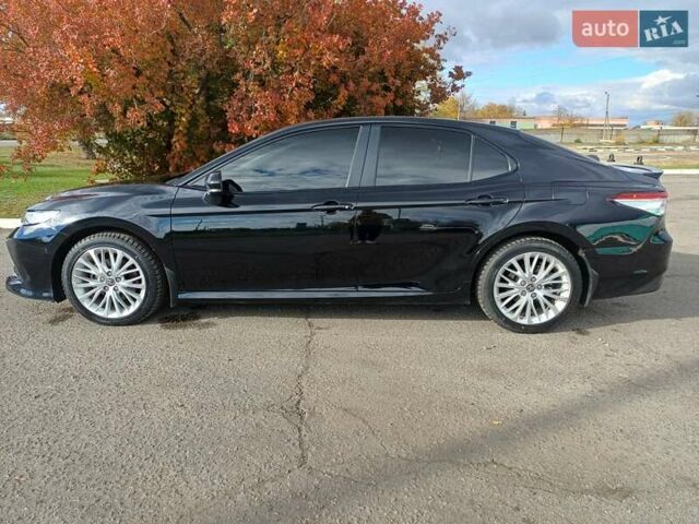 Чорний Тойота Камрі, об'ємом двигуна 2.49 л та пробігом 80 тис. км за 20999 $, фото 11 на Automoto.ua