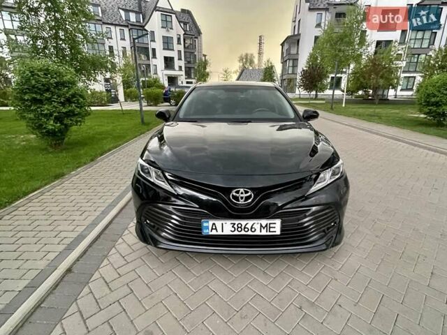 Чорний Тойота Камрі, об'ємом двигуна 2.49 л та пробігом 124 тис. км за 23900 $, фото 1 на Automoto.ua