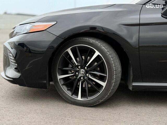 Черный Тойота Камри, объемом двигателя 2.5 л и пробегом 105 тыс. км за 24990 $, фото 4 на Automoto.ua