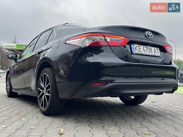 Черный Тойота Камри, объемом двигателя 2.5 л и пробегом 112 тыс. км за 22900 $, фото 10 на Automoto.ua