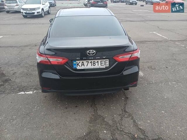 Черный Тойота Камри, объемом двигателя 2.49 л и пробегом 115 тыс. км за 24500 $, фото 1 на Automoto.ua