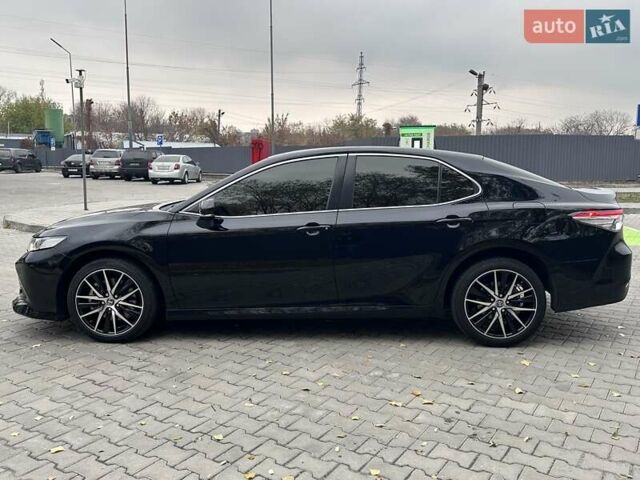 Черный Тойота Камри, объемом двигателя 2.5 л и пробегом 112 тыс. км за 22900 $, фото 5 на Automoto.ua