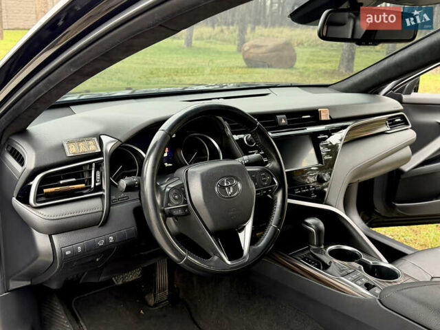 Черный Тойота Камри, объемом двигателя 2.5 л и пробегом 270 тыс. км за 23500 $, фото 24 на Automoto.ua