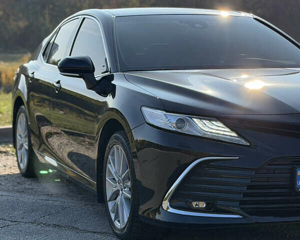 Черный Тойота Камри, объемом двигателя 2.49 л и пробегом 90 тыс. км за 33500 $, фото 3 на Automoto.ua