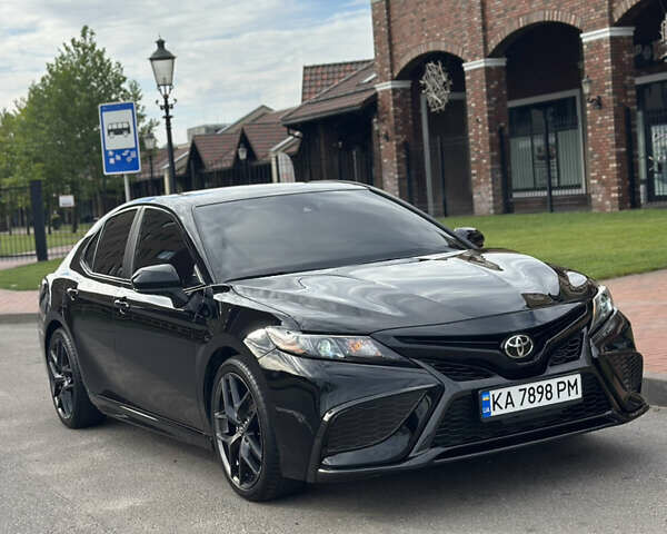 Черный Тойота Камри, объемом двигателя 2.49 л и пробегом 86 тыс. км за 25000 $, фото 1 на Automoto.ua