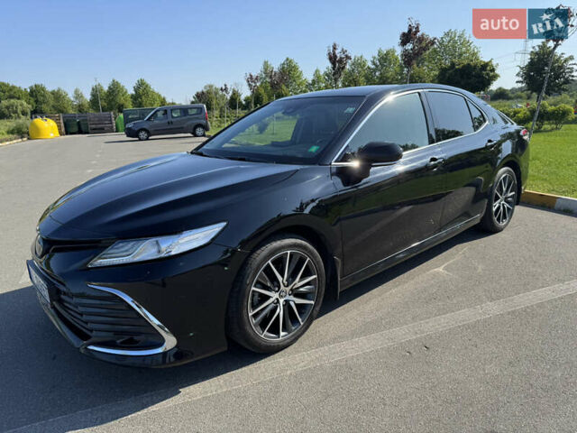 Черный Тойота Камри, объемом двигателя 2.49 л и пробегом 195 тыс. км за 32900 $, фото 1 на Automoto.ua