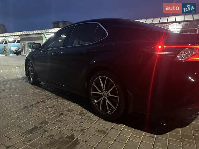 Чорний Тойота Камрі, об'ємом двигуна 2.49 л та пробігом 82 тис. км за 29000 $, фото 1 на Automoto.ua