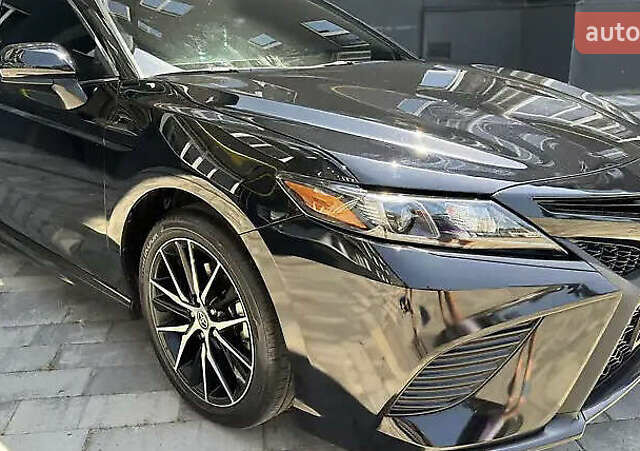 Чорний Тойота Камрі, об'ємом двигуна 2.49 л та пробігом 87 тис. км за 23000 $, фото 2 на Automoto.ua