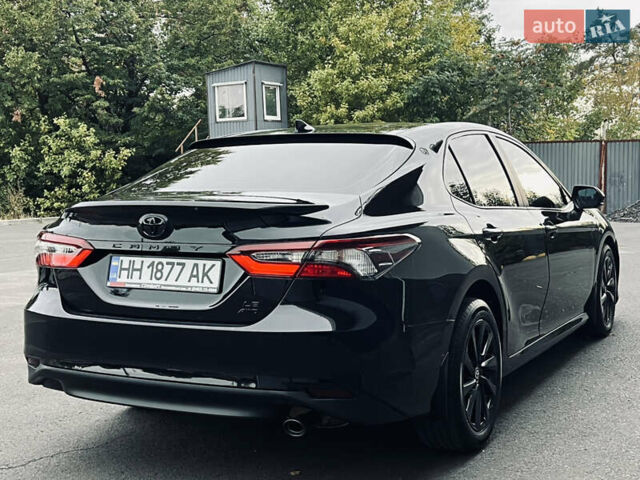 Черный Тойота Камри, объемом двигателя 2.5 л и пробегом 57 тыс. км за 23700 $, фото 57 на Automoto.ua