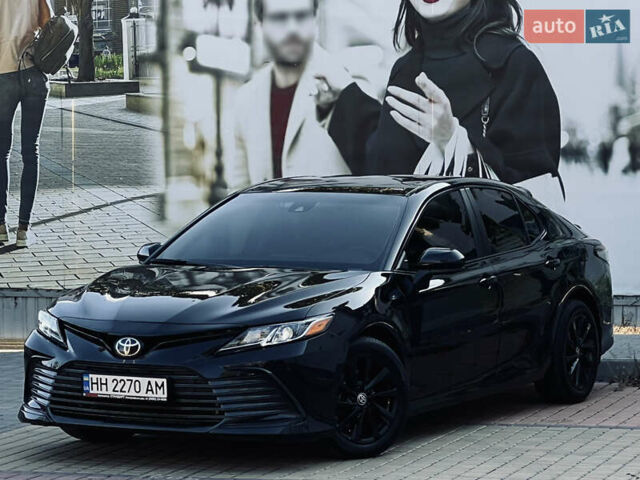 Черный Тойота Камри, объемом двигателя 2.49 л и пробегом 57 тыс. км за 22700 $, фото 2 на Automoto.ua