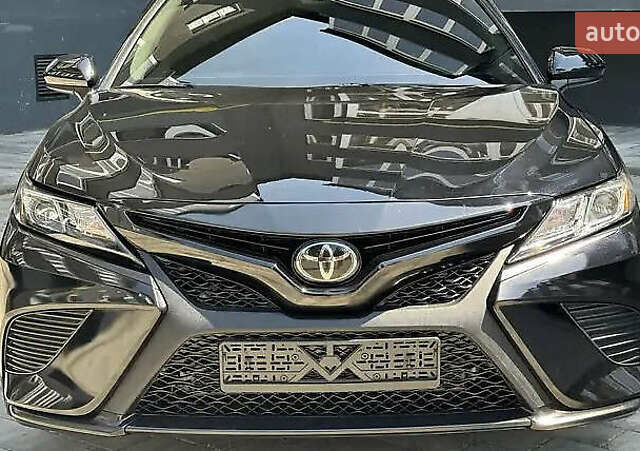 Чорний Тойота Камрі, об'ємом двигуна 2.49 л та пробігом 87 тис. км за 23000 $, фото 1 на Automoto.ua