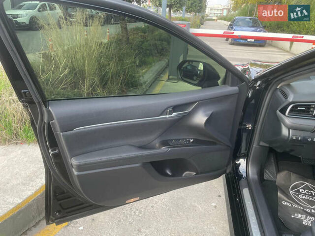 Чорний Тойота Камрі, об'ємом двигуна 2.49 л та пробігом 32 тис. км за 31500 $, фото 4 на Automoto.ua