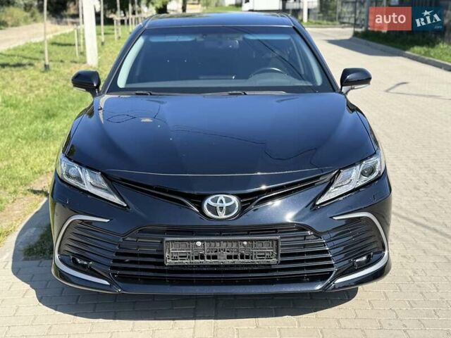 Чорний Тойота Камрі, об'ємом двигуна 2.49 л та пробігом 159 тис. км за 24500 $, фото 1 на Automoto.ua