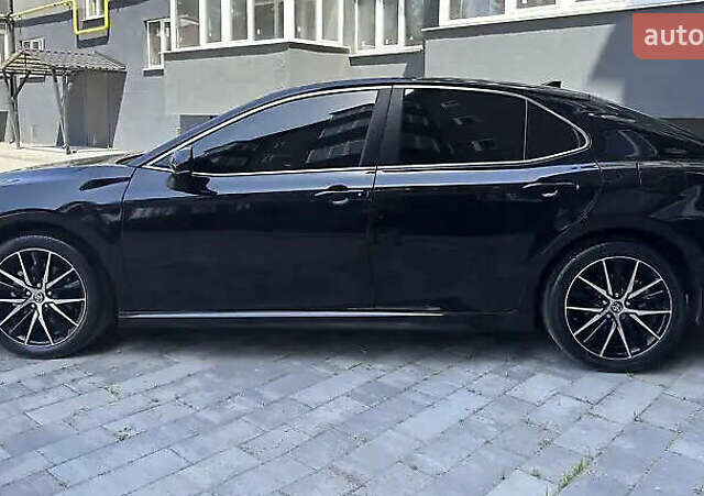 Чорний Тойота Камрі, об'ємом двигуна 2.49 л та пробігом 87 тис. км за 23000 $, фото 3 на Automoto.ua