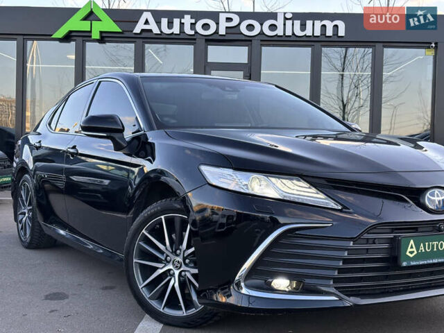 Черный Тойота Камри, объемом двигателя 2.49 л и пробегом 131 тыс. км за 32000 $, фото 1 на Automoto.ua