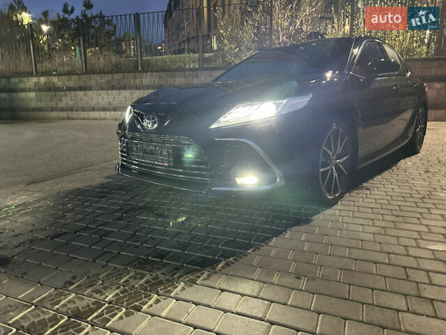 Чорний Тойота Камрі, об'ємом двигуна 2.49 л та пробігом 82 тис. км за 29000 $, фото 4 на Automoto.ua