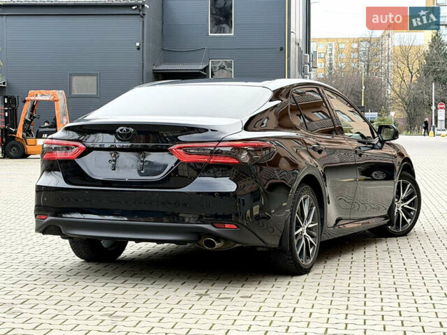 Чорний Тойота Камрі, об'ємом двигуна 2.49 л та пробігом 89 тис. км за 28500 $, фото 2 на Automoto.ua