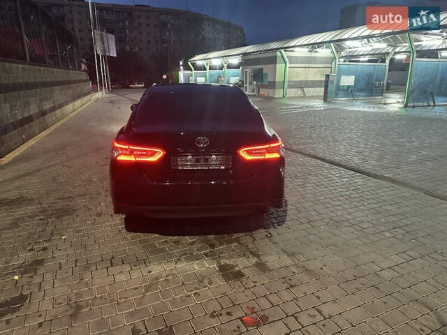 Чорний Тойота Камрі, об'ємом двигуна 2.49 л та пробігом 82 тис. км за 29000 $, фото 2 на Automoto.ua
