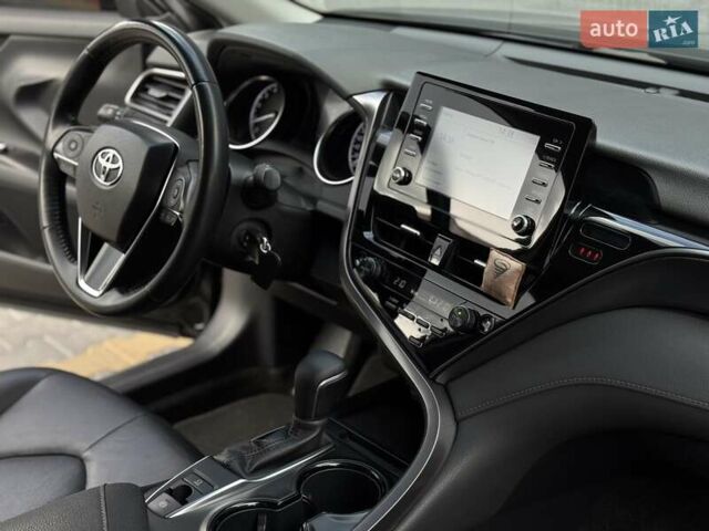 Черный Тойота Камри, объемом двигателя 2.49 л и пробегом 79 тыс. км за 27900 $, фото 1 на Automoto.ua