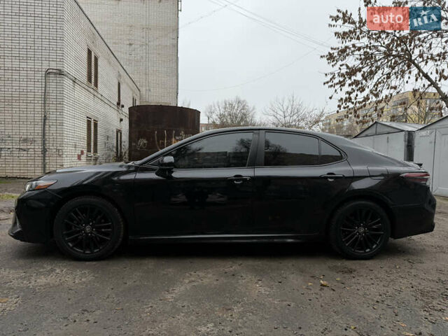 Черный Тойота Камри, объемом двигателя 2.49 л и пробегом 83 тыс. км за 18500 $, фото 2 на Automoto.ua