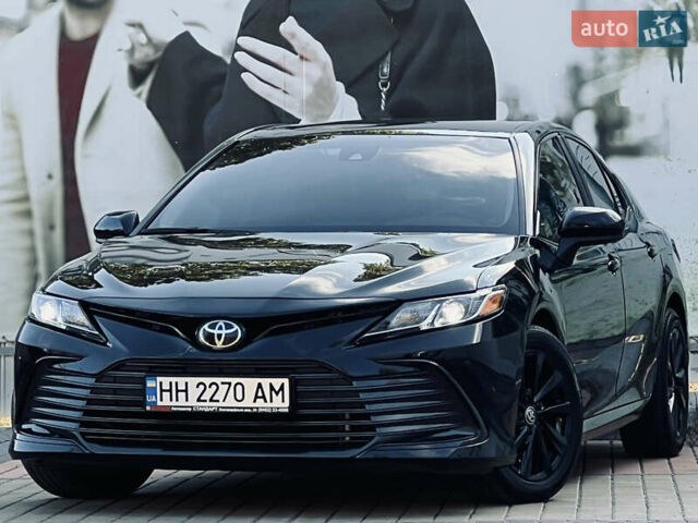 Черный Тойота Камри, объемом двигателя 2.49 л и пробегом 57 тыс. км за 22700 $, фото 4 на Automoto.ua