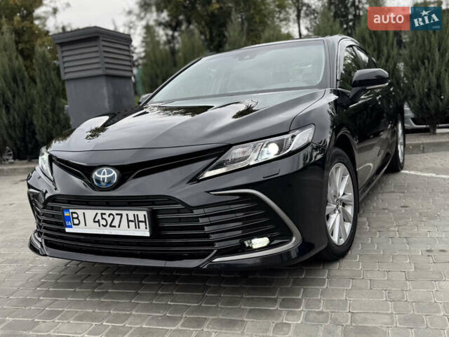 Черный Тойота Камри, объемом двигателя 2.49 л и пробегом 104 тыс. км за 29700 $, фото 1 на Automoto.ua