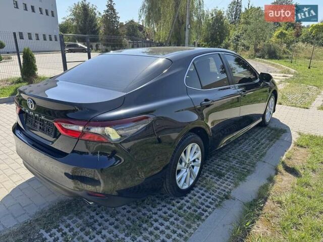 Чорний Тойота Камрі, об'ємом двигуна 2.49 л та пробігом 159 тис. км за 24500 $, фото 4 на Automoto.ua
