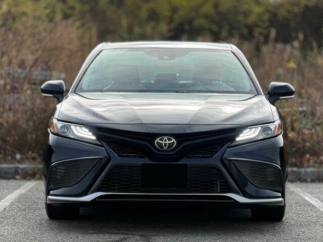 Черный Тойота Камри, объемом двигателя 2.5 л и пробегом 23 тыс. км за 21300 $, фото 1 на Automoto.ua