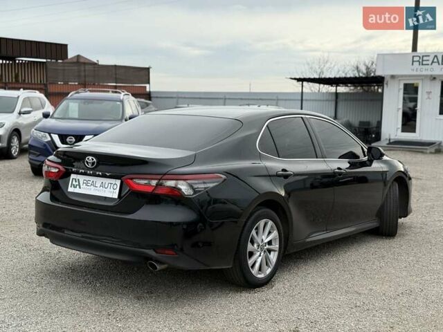 Черный Тойота Камри, объемом двигателя 2.49 л и пробегом 99 тыс. км за 27500 $, фото 1 на Automoto.ua