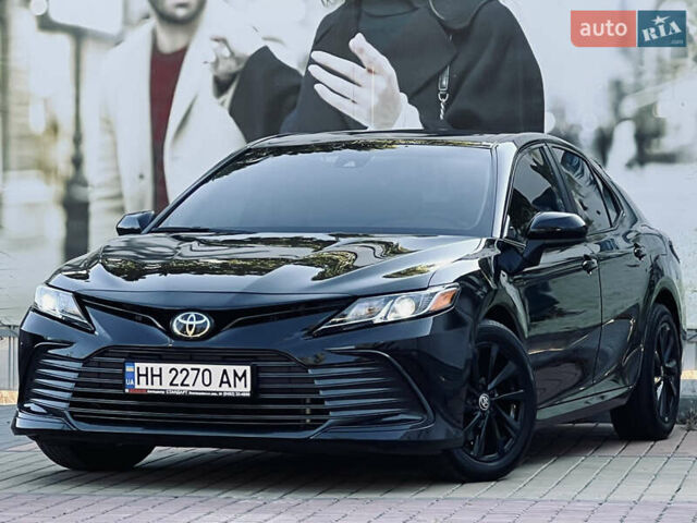 Черный Тойота Камри, объемом двигателя 2.49 л и пробегом 57 тыс. км за 22700 $, фото 1 на Automoto.ua