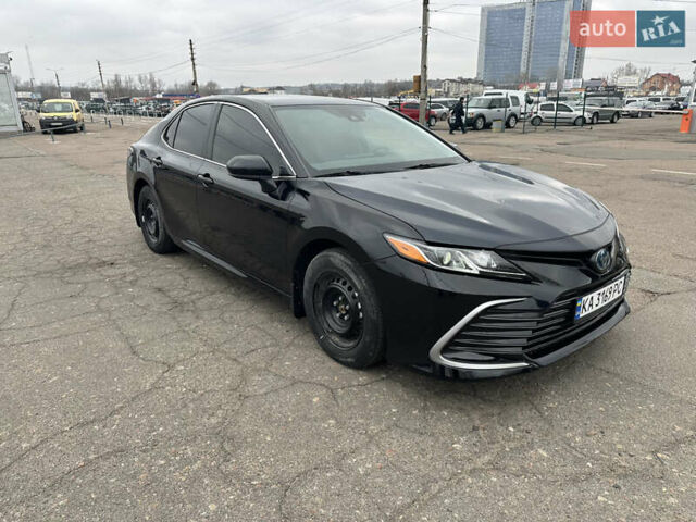 Черный Тойота Камри, объемом двигателя 2.49 л и пробегом 64 тыс. км за 29500 $, фото 1 на Automoto.ua