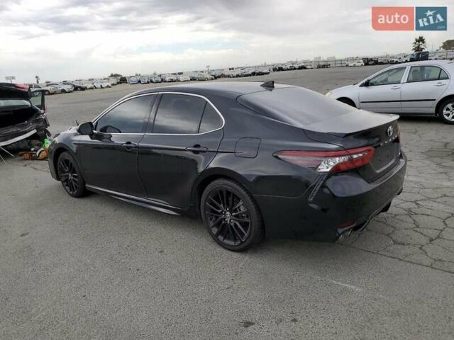 Черный Тойота Камри, объемом двигателя 2.49 л и пробегом 60 тыс. км за 9400 $, фото 1 на Automoto.ua