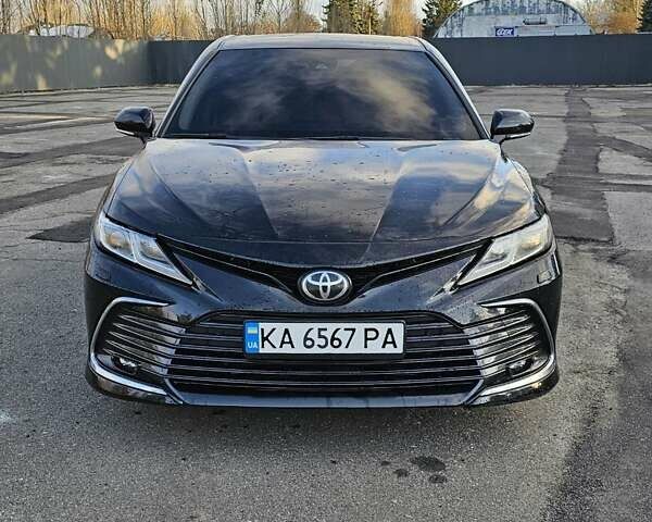 Черный Тойота Камри, объемом двигателя 2.49 л и пробегом 50 тыс. км за 22800 $, фото 1 на Automoto.ua
