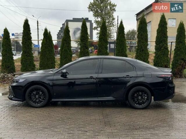 Черный Тойота Камри, объемом двигателя 2.49 л и пробегом 90 тыс. км за 31999 $, фото 1 на Automoto.ua