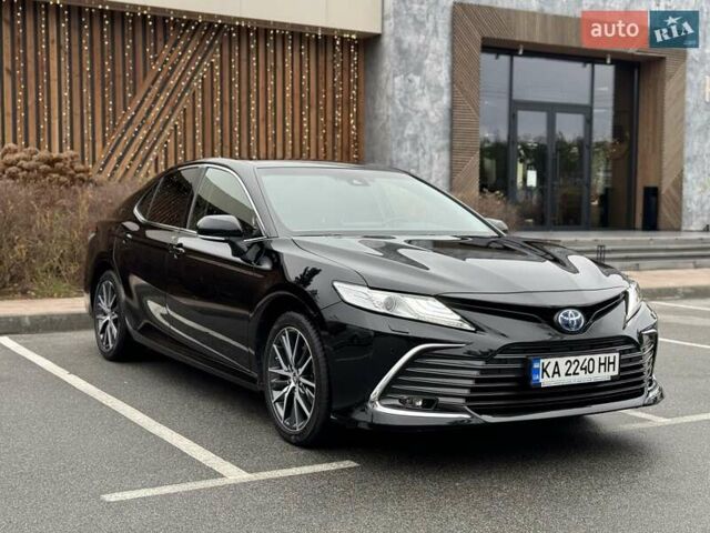 Черный Тойота Камри, объемом двигателя 2.49 л и пробегом 74 тыс. км за 33800 $, фото 1 на Automoto.ua
