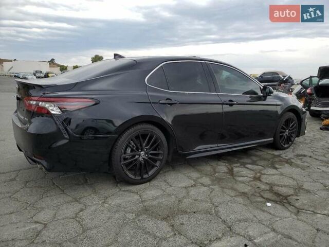 Черный Тойота Камри, объемом двигателя 2.49 л и пробегом 60 тыс. км за 9400 $, фото 2 на Automoto.ua