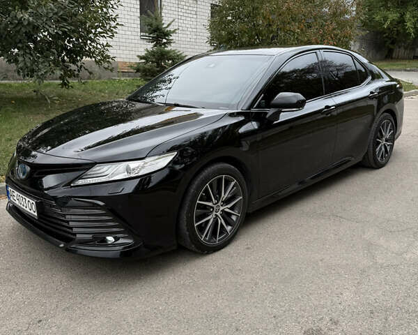 Черный Тойота Камри, объемом двигателя 2.49 л и пробегом 59 тыс. км за 36600 $, фото 1 на Automoto.ua