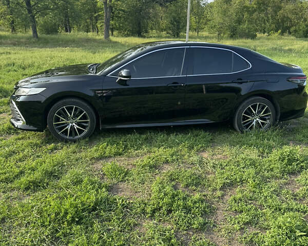 Черный Тойота Камри, объемом двигателя 2.49 л и пробегом 80 тыс. км за 35500 $, фото 4 на Automoto.ua