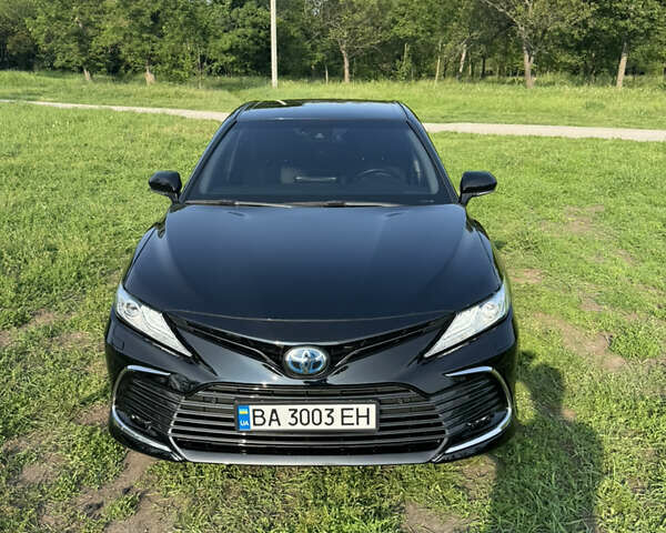 Черный Тойота Камри, объемом двигателя 2.49 л и пробегом 80 тыс. км за 35500 $, фото 1 на Automoto.ua