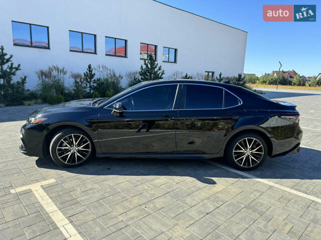 Черный Тойота Камри, объемом двигателя 2.5 л и пробегом 75 тыс. км за 25500 $, фото 21 на Automoto.ua